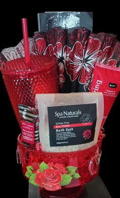 Red giftset with bath salts,hand lotion,cup, hand fan in a beautiful red container. Red Birthday Gifts, Red Basket Gift Ideas, Valentines Basket Ideas, Iced Coffee Protein Shake Recipe, Making A Gift Basket, Iced Coffee Protein Shake, Candy Arrangements, Appreciation Gifts Diy, Valentines Day Baskets