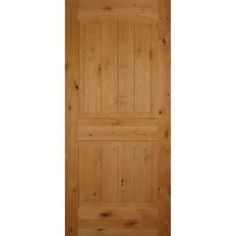 a wooden door with no glass on the front and side paneled in pine wood