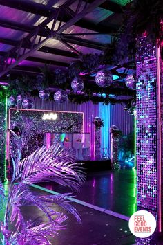 an indoor dance floor with disco lights and decorations