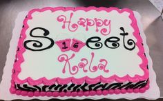 a sheet cake with pink and black frosting that says happy sweet hola on it