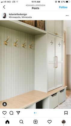 a room with some cabinets and baskets on the wall