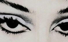 the eyes of a woman with long eyelashes