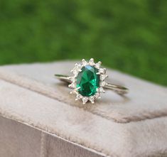 * Material: 925 Sterling Silver * DETAILS ✥ Handmade Ring ✥ - Center Stone: Lab Emerald  - Center Stone Size: 6X8 MM - Center Stone Shape: Oval - Side Stone: CZ Diamond  ✥ O T H E R ∙ I N F O R M A T I ON ✥ ♦ Your item will be nicely packed to gift in elegant jewelry boxes. ♦ Custom Order We can make custom rings in almost any shape and style. If you want a specific model, please send us a clear picture and we will do our best. ♦ Delivery All Item will be Shipped within 3 to 5 Days after payment Emerald Ring Wedding, Wedding Ring Silver, Silver Anniversary Gifts, Emerald Wedding Rings, Green Emerald Ring, Silver Anniversary, Silver Wedding Rings, Art Deco Ring, Anniversary Gift For Her