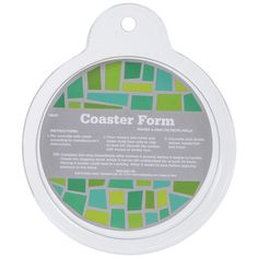 a round white tag with green and blue squares on the front, saying coaster form