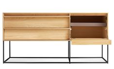 the sideboard is made from wood and has two shelves on each side, with one door open