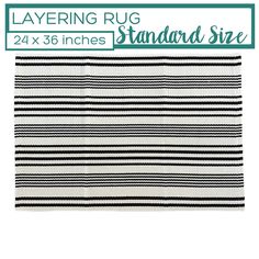 a black and white striped rug with the words layering rug standard size