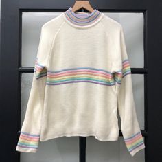 New With Tags Unif Cream Sweater With Prisma Rainbow Pastel Stripes. Size Extra Small. 75% Acrylic/21% Nylon/4% Spandex. From A Smoke Free Home. Unif Sweater, Strawberry Shortcake And Friends, Cream Pastel, Pastel Knits, Outfits Pastel, Cross Sweater, Pastel Sweater, Oversized Grey Sweater, Mockneck Sweater