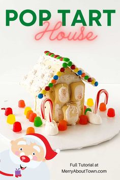 a small house made out of candy and marshmallows with the words pop tart house above it