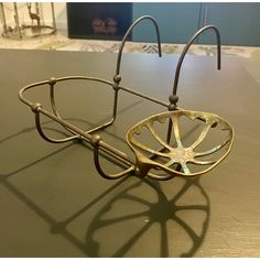 a pair of glasses sitting on top of a table next to a lamp shade holder