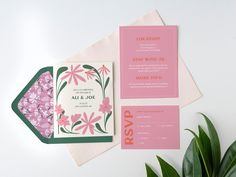 a pink and green wedding suite with matching stationery