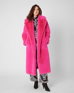 Chic Pink Spring Fur Coat, Chic Pink Fur Coat For Spring, Elegant Pink Fur Coat For Fall, Luxury Faux Fur Spring Coat, Chic Pink Faux Fur Coat, Luxury Pink Long Sleeve Outerwear, Luxury Long Sleeve Pink Outerwear, Chic Pink Fur Coat For Fall, Luxury Pink Winter Outerwear