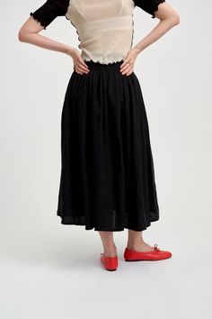 This midi length skirt in black linen fabric features a flattering basque waistband and is fully lined with cotton. Complete with charming black velvet bows on the side, this skirt has pockets for everything you need. - 100% Linen - Wash in cool water and lay flat to dry - Made in Canada Flat measurements in inches are as follows: Size - Waist - Hip - Length (Waist - Hem)XS: 24.5, 37+, 31.5S: 26.5, 41+, 31.5M: 28.5, 44+, 31.5L: 30.5, 47+, 31.5XL: 32.5, 50+, 31.5XXL: 34.5, 54+, 31.5 Black Linen Fabric, Velvet Bows, Black Velvet Bow, Cropped Flare Pants, Seersucker Dress, Midi Length Skirts, White Eyelet, Linen Skirt, Velvet Bow