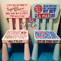 two children's plastic chairs sitting next to each other on a blue carpeted floor