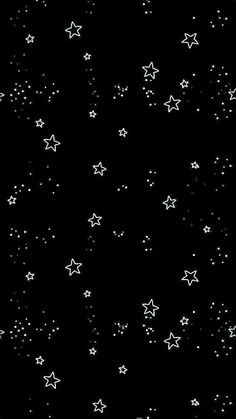 white stars on a black background