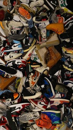 a pile of shoes that are all different colors