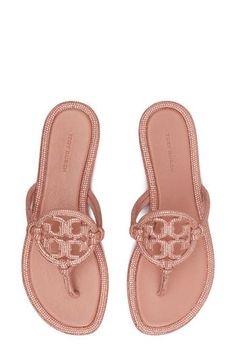 Tonal pavé crystals flood the slender straps and signature medallion of this glitzy sandal set on a slender, cushioned footbed. Flat sole Leather upper and lining/rubber sole Imported Tory Burch Miller, Fabric Gift Bags, Fabric Gifts, Free Fabric, Sandal Women, Print Gifts, Women's Shoes Sandals, Gift Bag, Tory Burch