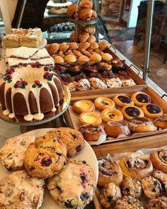 many different types of pastries are on display