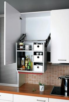 the kitchen is clean and ready to be used as a storage area for food items