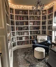 a living room filled with furniture and lots of bookshelves covered in shelves full of books