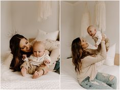 a woman holding a baby on her lap while laying on a bed with two other women