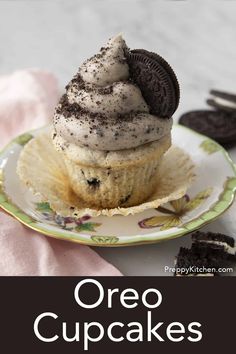 an oreo cupcake on a plate with cookies