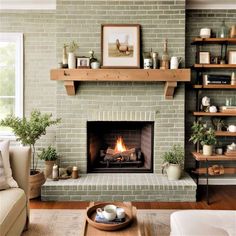 a living room filled with furniture and a fire place in the middle of a fireplace