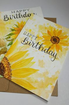 two birthday cards with sunflowers on them, one is yellow and the other is brown