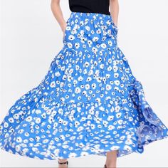 Brand New With Tags. Zara’s Blue With White Flower Maxi Skirt. Twirl In The Skirt As It Flows All Around Zara Tiered Skirt For Vacation, Spring Vacation Full Skirt Bottoms, Blue Fitted Maxi Skirt For Spring, Fitted Blue Maxi Skirt For Spring, Zara Tiered Maxi Skirt For Summer, Blue Midi Skirt For Vacation, Blue Flared Maxi Skirt For Vacation, Chic Blue Maxi Skirt For Day Out, Blue Tiered Maxi Skirt For Day Out