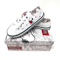 Item: Children's Shoes Material: Canvas Color: White Character: Snoopy Cute White Sneakers With Cartoon Print, Casual White Sneakers With Cartoon Print, Fun White Low-top Canvas Shoes, Cute Red Sneakers For Streetwear, Cute White Canvas Shoes With Rubber Sole, White Canvas Shoes With Rubber Sole, White Non-slip Fun Sneakers, Cute White Slip-on Canvas Shoes, Non-slip White Sneakers