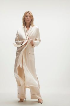 Drape yourself in opulence with the Brigitte Silk Robe. The ultimate luxury for chilly mornings or after a hot shower. 100% Silk Charmeuse Open-front robe with tie-waist Patch pockets Contrast piping 52" length (size small) Dry Clean Only All sale items are FINAL SALE. Champagne Bronze, Silk Robe, Contrast Piping, Silk Charmeuse, Long A Line, Front Open, Sale Items, Piping, Final Sale