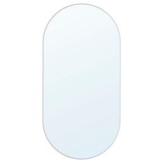 a white oval mirror on a white background