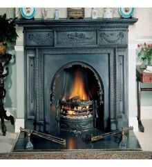 an ornate fireplace in a living room