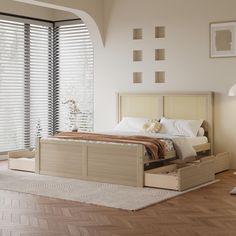 a bed sitting in a bedroom next to a window with blinds on the windowsill