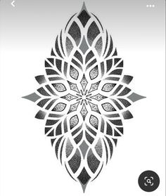 the back side of a tattoo design, with an intricate flower pattern in black and white