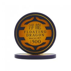 a red and gold plaque with the words floating dragon on it's base, in front of a white background