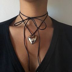 "This beautiful  Gold Plated Puffed Heart Leather Black Cord Necklace is crafted with care and love. Its dainty and minimalistic style is great everyday wear or special occasion. It also makes a perfect gift for a wife, girlfriend, sister, mom or yourself! You can also get both colors to be matching with your loved one. 💌Specifications The long cord allows you to wear it in so many different ways, style as you like. - Material: Gold Plated/ Leather - Pendant Size: 1x1cm - Necklace Length: 1.5\" Chunky Heart Necklace Outfit, Chocker Aesthetics, Heart Necklace Outfit, Chocker Neckless, Puffy Heart Necklace, Necklace String, Edgy Accessories, Black Cord Necklace, Jewelry Accessories Ideas