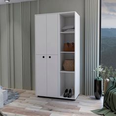 a white cabinet with shoes on it in a living room next to a couch and window