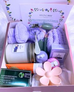 an open pink box filled with personal care items