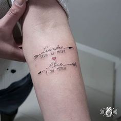 a woman's arm with an arrow tattoo that reads, i love you to the moon and back