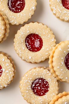 small pies with jelly filling on them are arranged in the shape of mini tarts