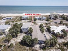 an aerial view of the beach access area