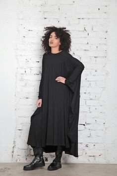 Black Maxi Dress, Women Maxi Dress, Black Kaftan Maxi Dress Maxi caftan dress in soft viscose jersey: |HANAMI| GARMENT FEATURES: * Comfy, easy to wear piece with striking design * Clean, minimalistic maxi dress silhouette * Loose crew neckline * Long sleeved with dramatic draping effect * Made from quality soft viscose jersey COLOUR OPTIONS: This product also comes in the following color options: - black; - rose ash; - grey; - dark navy; - red. SIZE & FIT: Model is 175cm and wears size S. CO Oversized Long Sleeve Black Abaya, Oversized Black Long Sleeve Abaya, Oversized Black Abaya, Oversized Long Sleeve Black Maxi Dress, Black Oversized Long Abaya, Oversized Black Long Abaya, Black Oversized Long Dresses, Oversized Long Black Dress, Black Oversized Lagenlook Dress