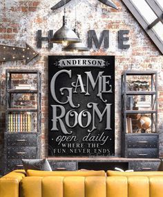 a living room filled with furniture and a large sign above it that says game room open daily