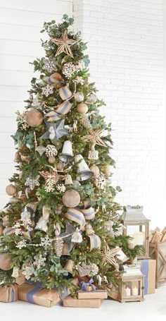 a decorated christmas tree with ornaments on it