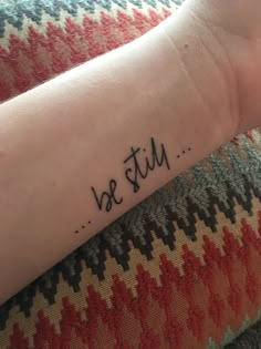 a person with a tattoo on their arm that says, we still have it in black ink