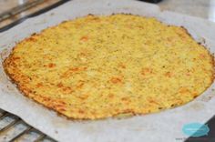 an uncooked pizza sitting on top of a pan