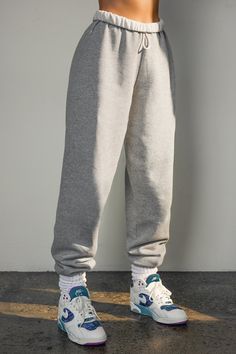 Side view of model from the waist down wearing the oversized loose fit classic grey french terry Oversized Jogger with an elastic waistband and ankle cuffs Brown Joggers, Cable Knit Socks, Joah Brown, Classic Grey, Terry Fabric, French Terry Fabric, Ankle Cuffs, Oversized Silhouette, Knitting Socks