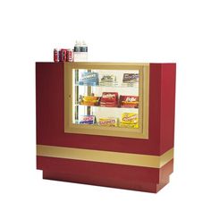 a red and gold colored display case with sodas on the top, snacks in the bottom