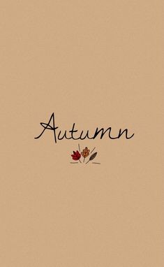 the word autumn written in cursive writing on a beige background