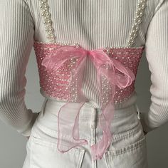 This sophisticated top is designed to give you tenderness and elegance. Pink beads and pearls bring a bit of romance and tenderness to this top, and a bow on the back gives the top a playful accent and completes the image. The top is perfect for romantic dates, special events and parties.  Product care: to maintain the quality and durability of the top, I recommend to avoid contact with water, oil, salt and acid. Beads Clothes, Corset Top Outfit, Beaded Crop Top, Fashion Top Outfits, Handmade Jewelry Tutorials, Wedding Top, Cropped Tube Top, Beaded Top, Pink Beads